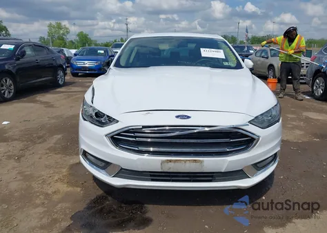2017 Ford Fusion Hybrid Se z USA, uszkodzony, nr VIN 3FA6P0LU0HR217389